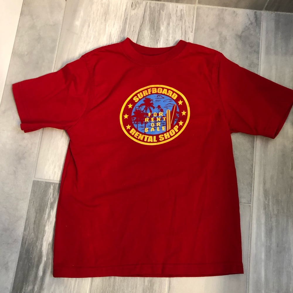 Shirt size 7 with surfing theme